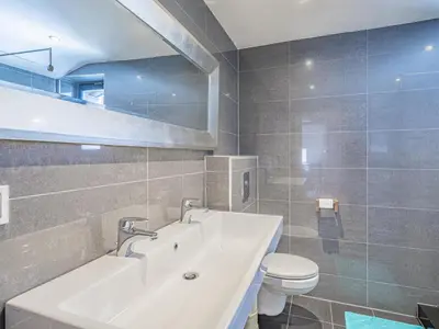 Ein Badezimmer in der Unterkunft Chalet Adriana