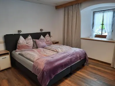 Ein Bett oder Betten in einem Zimmer der Unterkunft Gasthof Erzherzog Rainer - Zimmer und Ferienwohnung