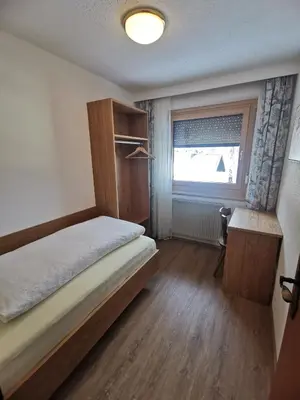 Ein Bett oder Betten in einem Zimmer der Unterkunft Apart Kofler's Panorama-Zillertal