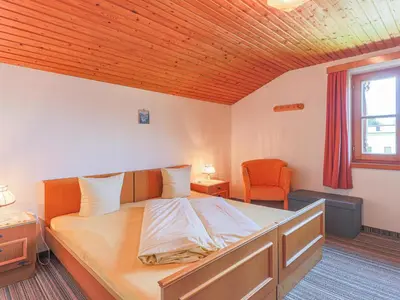 Ein Bett oder Betten in einem Zimmer der Unterkunft Feilgrub