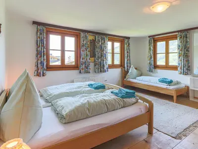 Ein Bett oder Betten in einem Zimmer der Unterkunft Feilgrub