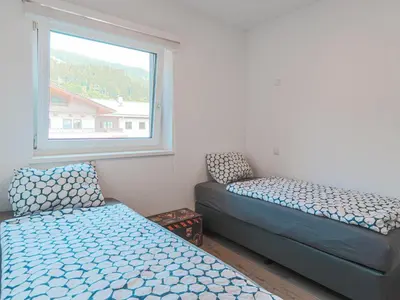 Ein Bett oder Betten in einem Zimmer der Unterkunft Residenz Brixental Top 8
