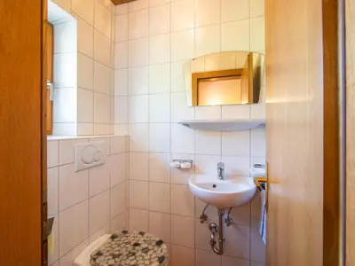 Ein Badezimmer in der Unterkunft Fankhauser