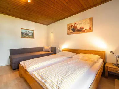 Ein Bett oder Betten in einem Zimmer der Unterkunft Fankhauser