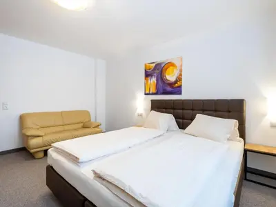 Ein Bett oder Betten in einem Zimmer der Unterkunft Rupertihof 3