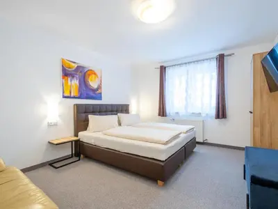 Ein Bett oder Betten in einem Zimmer der Unterkunft Rupertihof 3