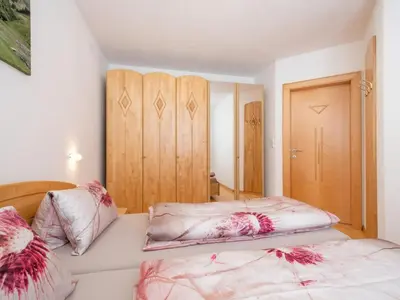 Ein Bett oder Betten in einem Zimmer der Unterkunft Bichl Viehofen