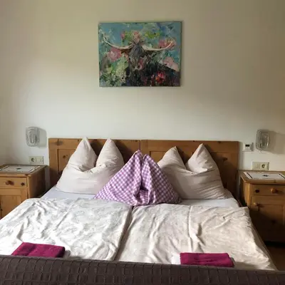 Ein Bett oder Betten in einem Zimmer der Unterkunft Oberachenhof