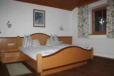 Ein Bett oder Betten in einem Zimmer der Unterkunft Landhaus Patricia
