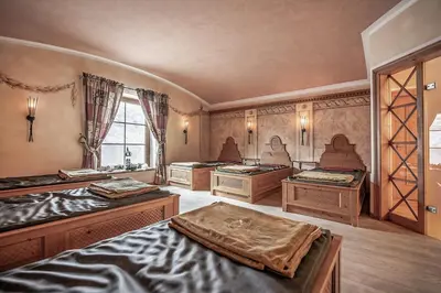 Ein Bett oder Betten in einem Zimmer der Unterkunft Das Karwendel - Ihr Wellness Zuhause am Achensee