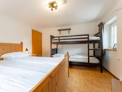 Ein Bett oder Betten in einem Zimmer der Unterkunft Kitzbüheler Alpen L