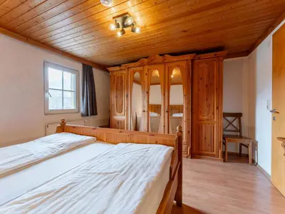 Ein Bett oder Betten in einem Zimmer der Unterkunft Kitzbüheler Alpen XL