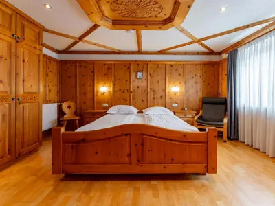 Ein Bett oder Betten in einem Zimmer der Unterkunft Kitzbüheler Alpen XL