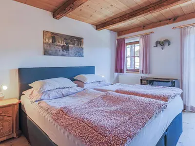 Ein Bett oder Betten in einem Zimmer der Unterkunft Hauserbauer