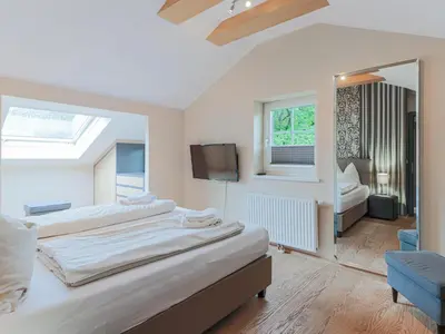 Ein Bett oder Betten in einem Zimmer der Unterkunft Schönfeld II