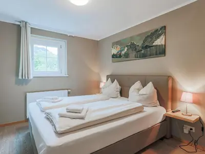 Ein Bett oder Betten in einem Zimmer der Unterkunft Schönfeld II
