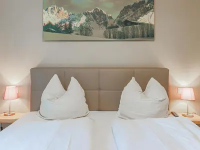 Ein Bett oder Betten in einem Zimmer der Unterkunft Schönfeld II