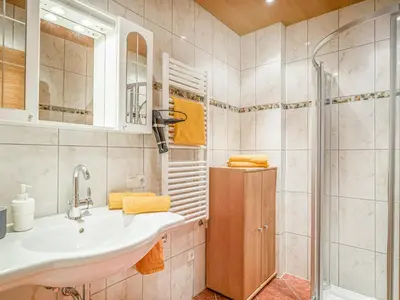 Ein Badezimmer in der Unterkunft Troadstadl XL