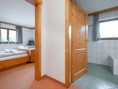 Ein Bett oder Betten in einem Zimmer der Unterkunft Mooshäusl