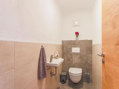 Ein Badezimmer in der Unterkunft Krammer XL