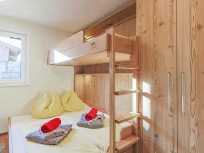 Ein Bett oder Betten in einem Zimmer der Unterkunft Krammer XL