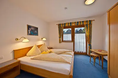 Ein Bett oder Betten in einem Zimmer der Unterkunft Ferienwohnungen Ehammer