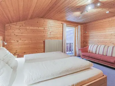 Ein Bett oder Betten in einem Zimmer der Unterkunft Glonersbühelhof Top 1