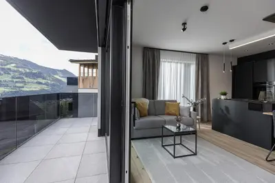 Ein Sitzbereich in der Unterkunft Grand Alpin Panorama Lodge Top 3