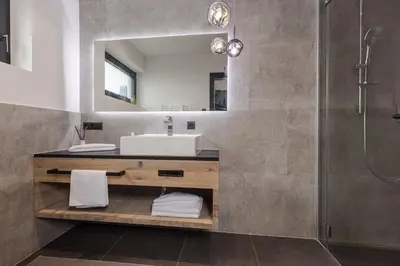 Ein Badezimmer in der Unterkunft Grand Alpin Panorama Lodge Top 3