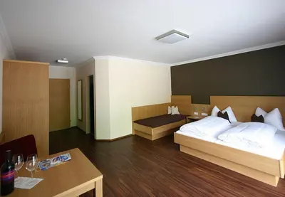 Ein Bett oder Betten in einem Zimmer der Unterkunft Hotel Herzblut - Joker card included in summer