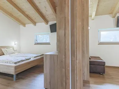 Ein Bett oder Betten in einem Zimmer der Unterkunft Michaela