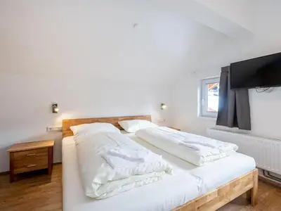 Ein Bett oder Betten in einem Zimmer der Unterkunft Kobelhäusl bei Hause - Yannick