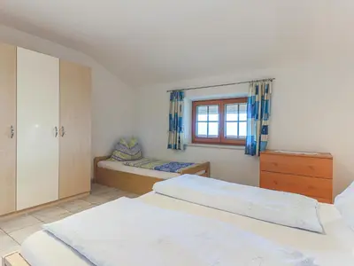 Ein Bett oder Betten in einem Zimmer der Unterkunft Koglbauer - Apartment Nr 4