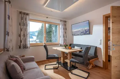 Ein Sitzbereich in der Unterkunft otto steiner appartements pension ellmau & wilder kaiser