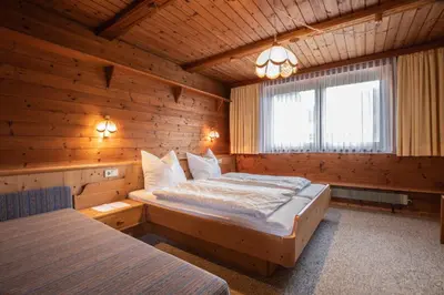 Ein Bett oder Betten in einem Zimmer der Unterkunft Christof,s Ferienwohnung WILD231