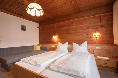 Ein Bett oder Betten in einem Zimmer der Unterkunft Christof,s Ferienwohnung WILD231