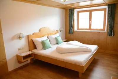 Ein Bett oder Betten in einem Zimmer der Unterkunft Appartements Alpenblick