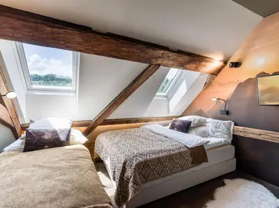 Ein Bett oder Betten in einem Zimmer der Unterkunft Appartement Milda im Haus Messinger - by NV-Appartements