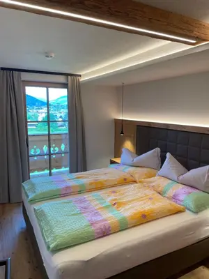 Ein Bett oder Betten in einem Zimmer der Unterkunft Wegrainhof