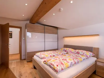 Ein Bett oder Betten in einem Zimmer der Unterkunft Wegrainhof