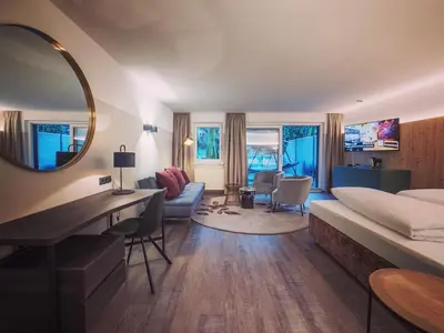 Ein Bett oder Betten in einem Zimmer der Unterkunft Hotel Malerhaus