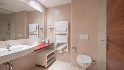 Ein Badezimmer in der Unterkunft Hotel Malerhaus