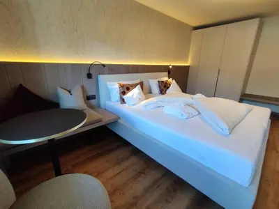 Ein Bett oder Betten in einem Zimmer der Unterkunft Hotel Malerhaus