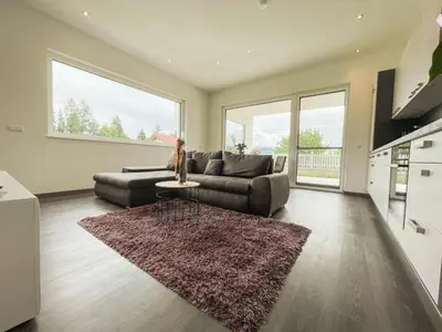 Ein Sitzbereich in der Unterkunft Apartment Spitzenblick