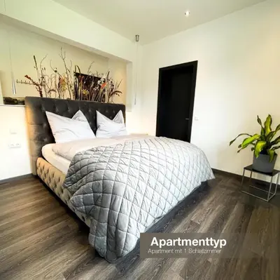 Ein Bett oder Betten in einem Zimmer der Unterkunft Apartment Spitzenblick