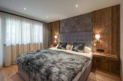 Ein Bett oder Betten in einem Zimmer der Unterkunft Alpine Lodge by Apartment Managers