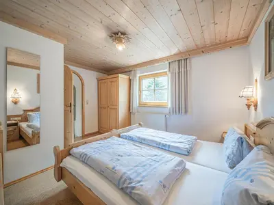 Ein Bett oder Betten in einem Zimmer der Unterkunft Weberhof Top 1