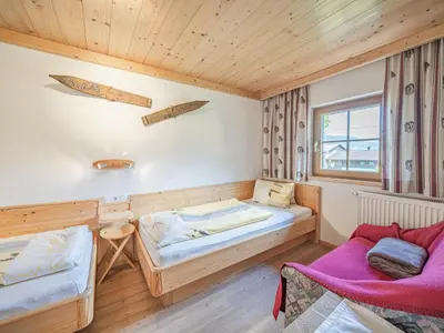 Ein Bett oder Betten in einem Zimmer der Unterkunft Weberhof Top 1