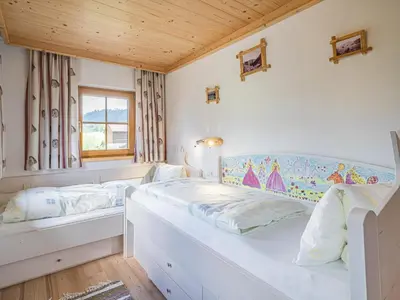 Ein Bett oder Betten in einem Zimmer der Unterkunft Weberhof Top 2