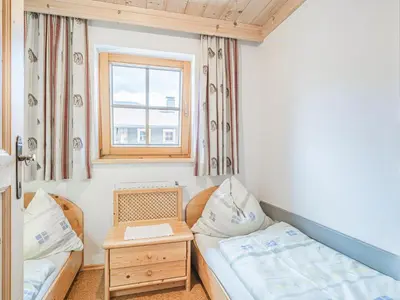 Ein Bett oder Betten in einem Zimmer der Unterkunft Weberhof Top 2